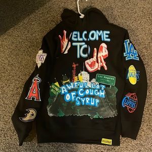I am selling my rolling loud Desto Dubb awful lot of cough syrup hoodie size S